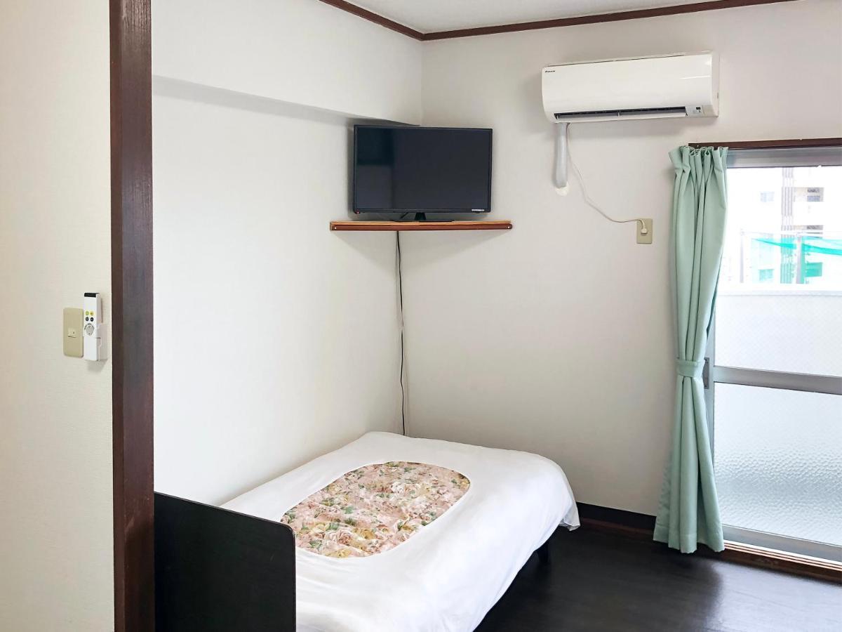 Sunset Hills Inn Naha Bagian luar foto