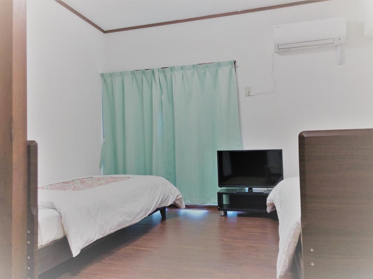 Sunset Hills Inn Naha Bagian luar foto