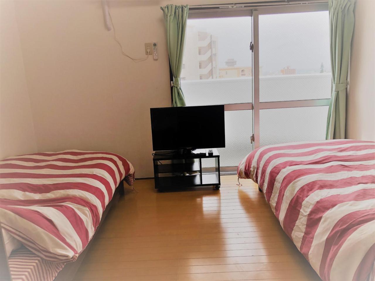 Sunset Hills Inn Naha Bagian luar foto