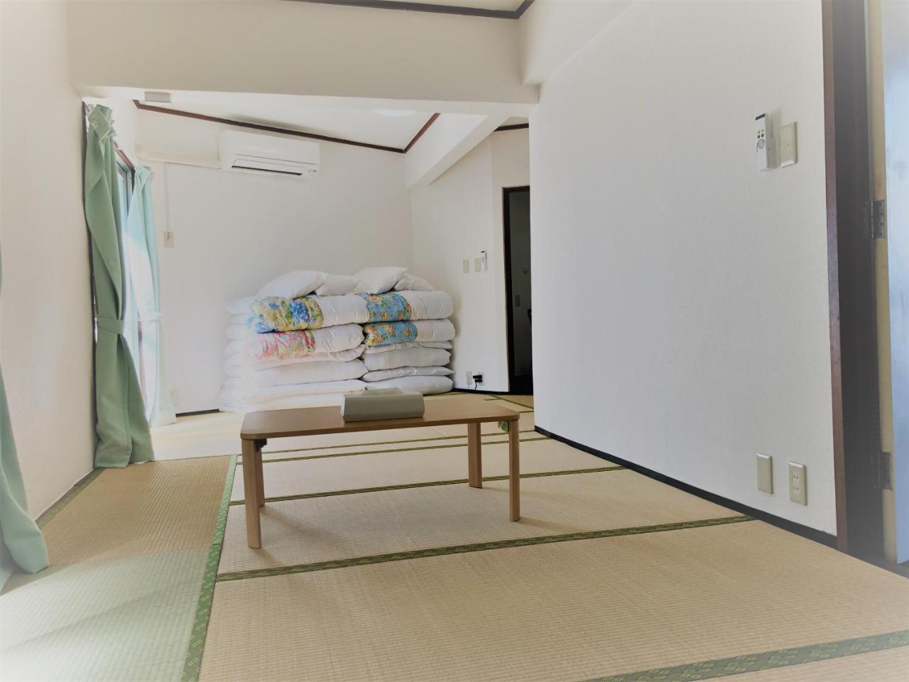 Sunset Hills Inn Naha Bagian luar foto